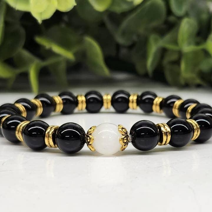 Obsidian With Selenite 8mm Smooth Bead Bracelet, Gold Colored Metal Beads Close Up