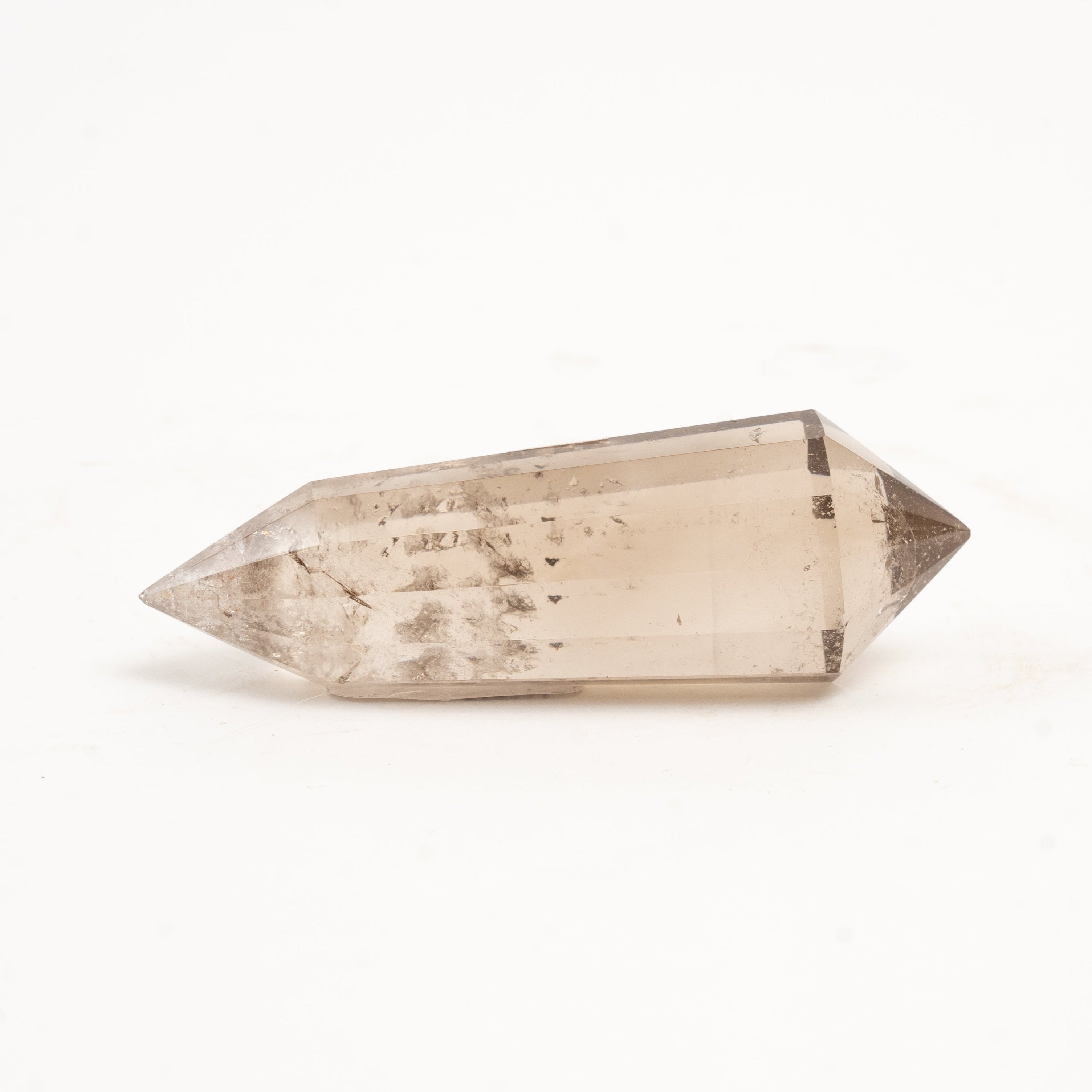 Smoky quartz crystal vogel on a white background