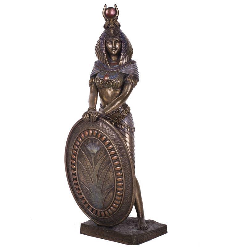 Egyptian goddess Isis Statue holding a shield, standing on a base.