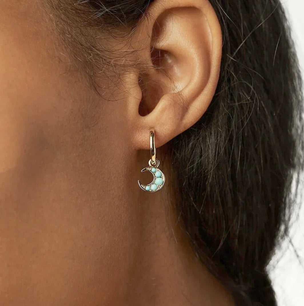 Moon Nova Turquoise Dangle Huggie Earrings on Ear