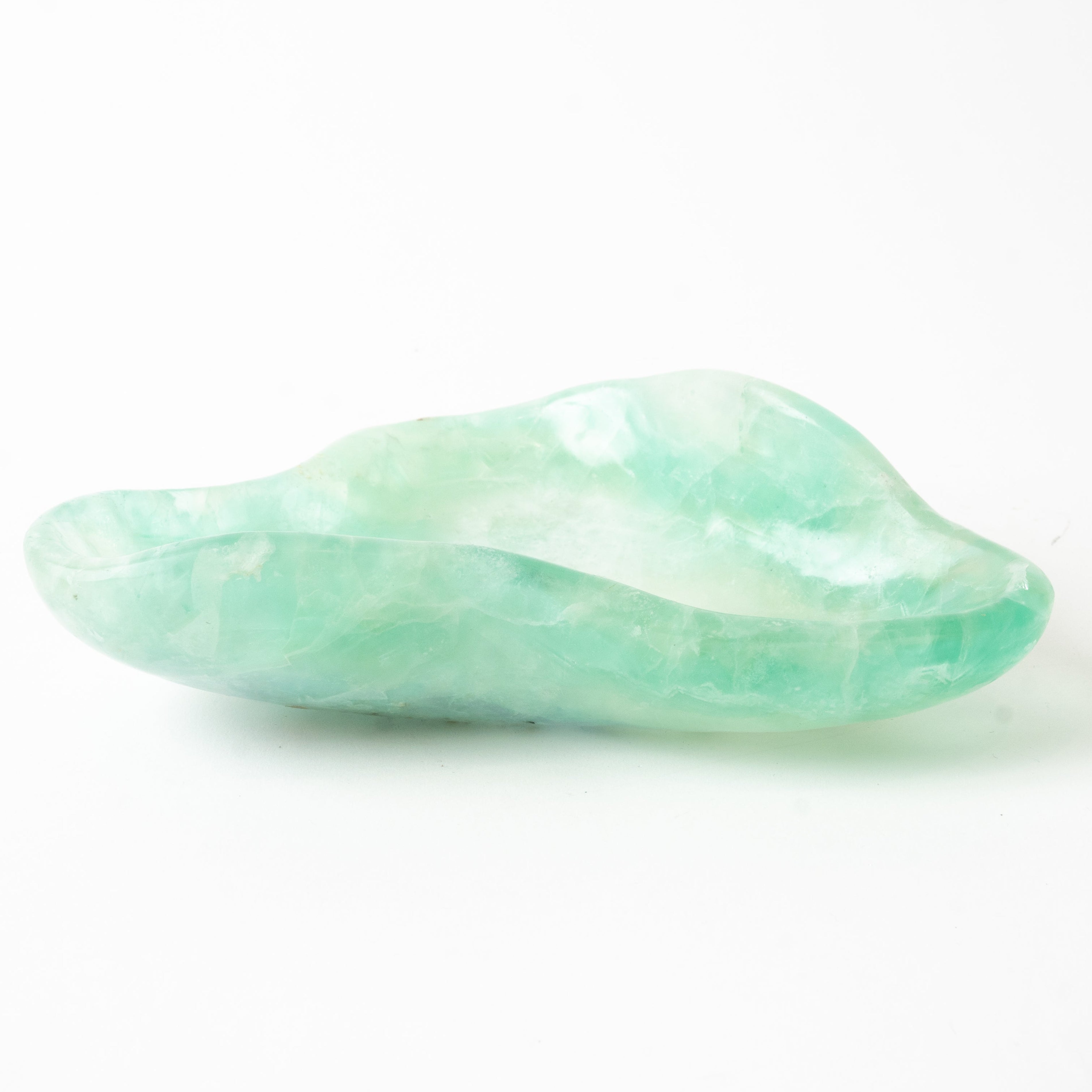 Green fluorite stone on a white background