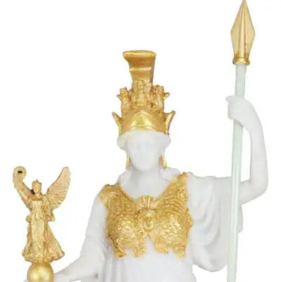 Statue of a classical figure in gold and white attire with a helmet and spear on a white background