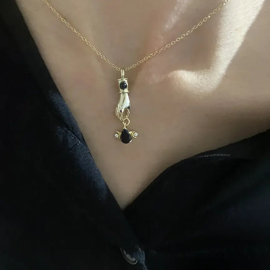 The Divine Hand Necklace on model