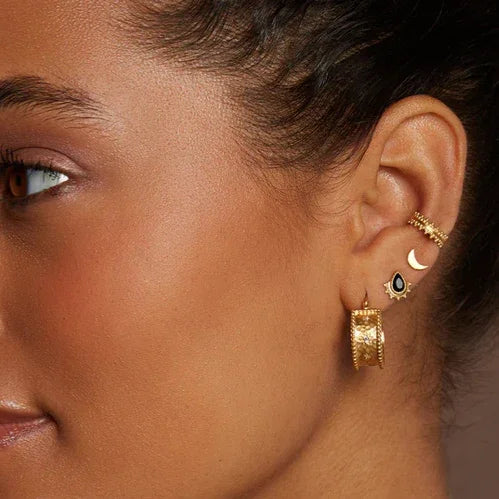 Topaz White Star Hoop Earrings, 18KT Gold Plated Brass close-up on model