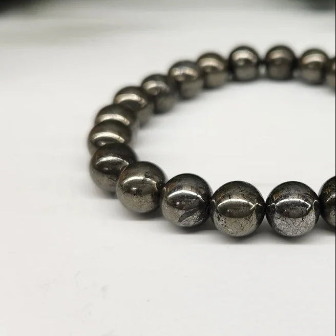 Pyrite Smooth Bead Stretch Bracelet Up Close