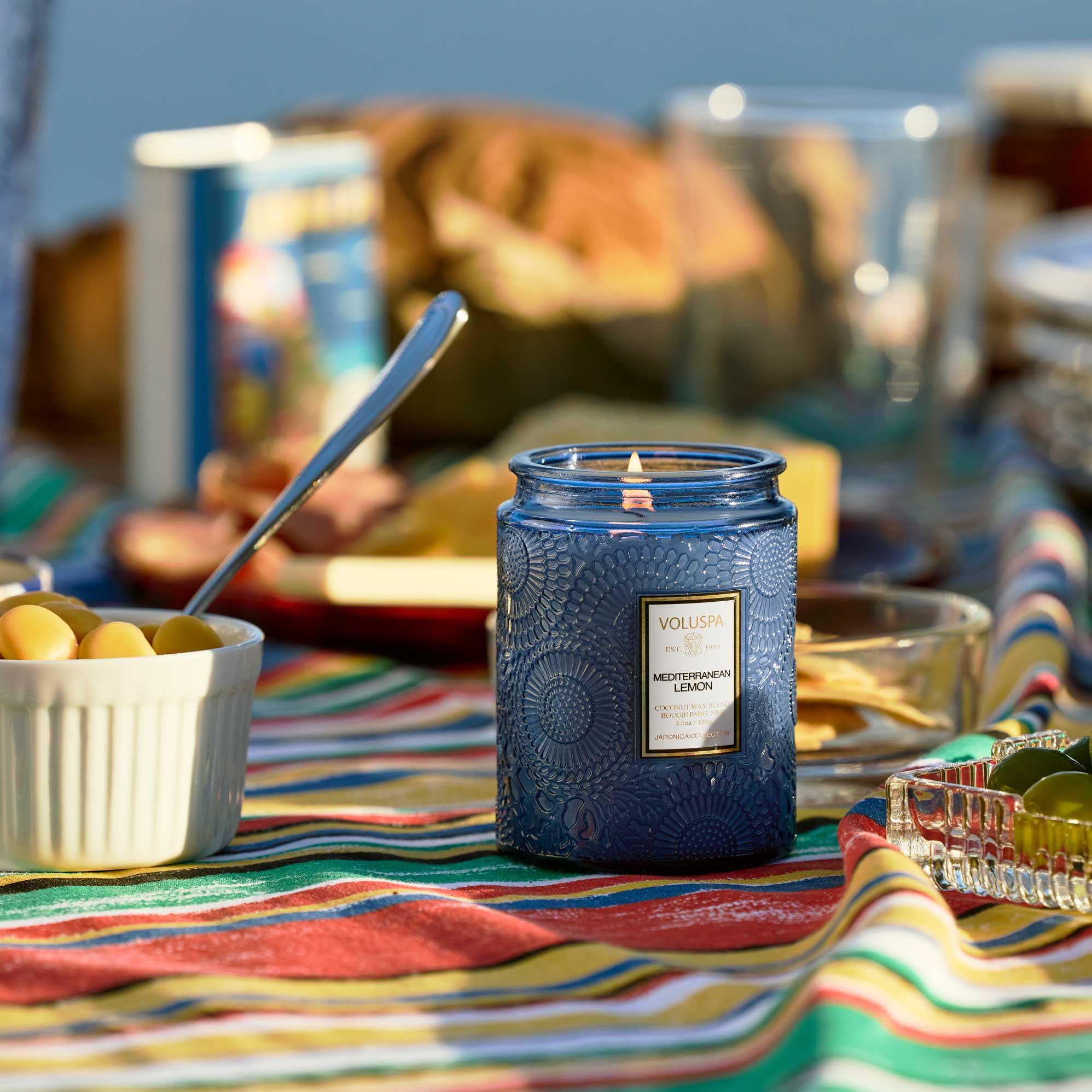 Voluspa Mediterranean Lemon Small Jar Candle 5.5 oz on table