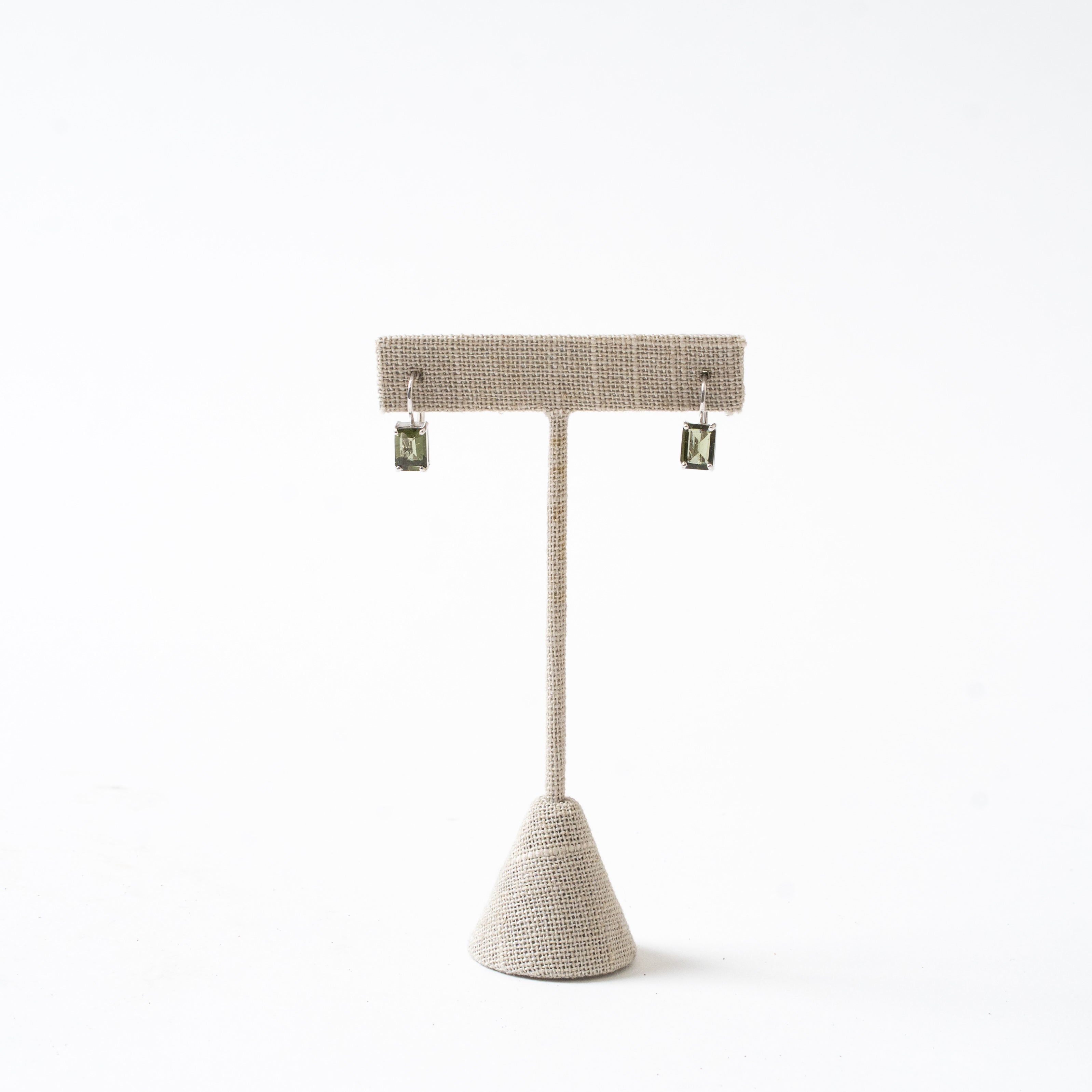 Emerald Cut Faceted Moldavite Earrings on Earring Stand