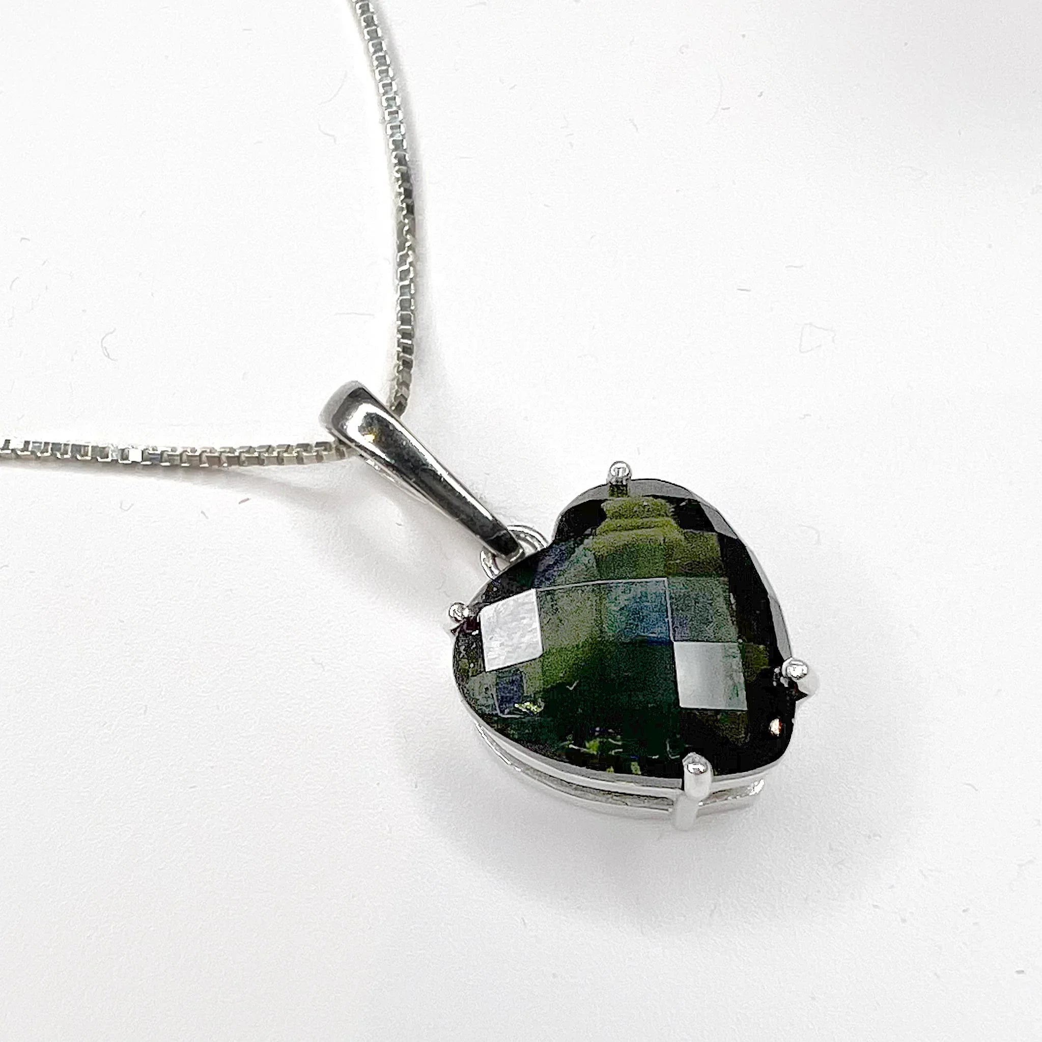 Moldavite Heart Faceted Pendant Necklace angled view