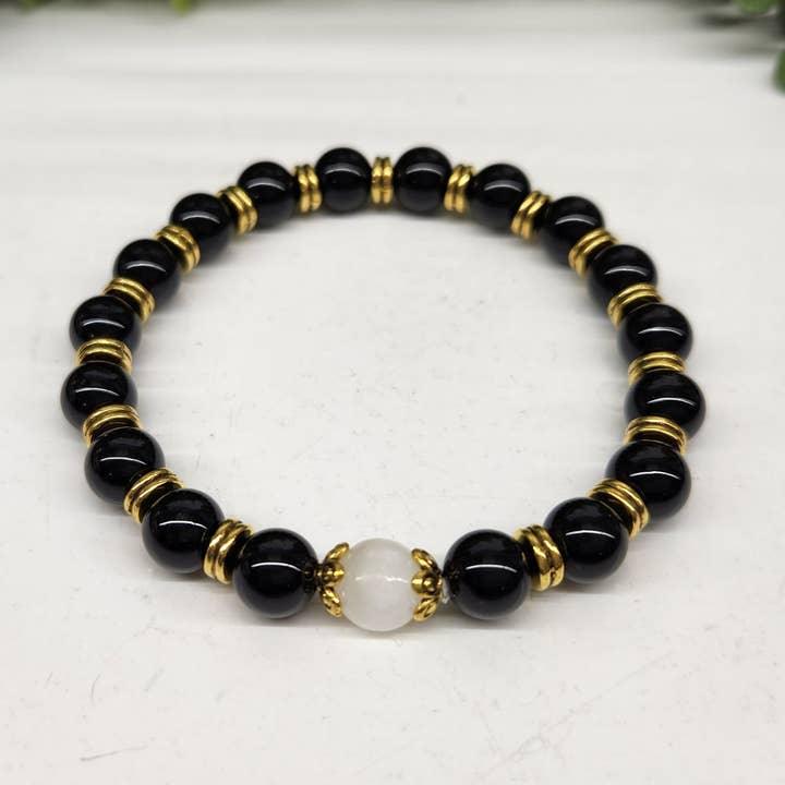 Obsidian With Selenite 8mm Smooth Bead Bracelet, Gold Colored Metal Beads Top View