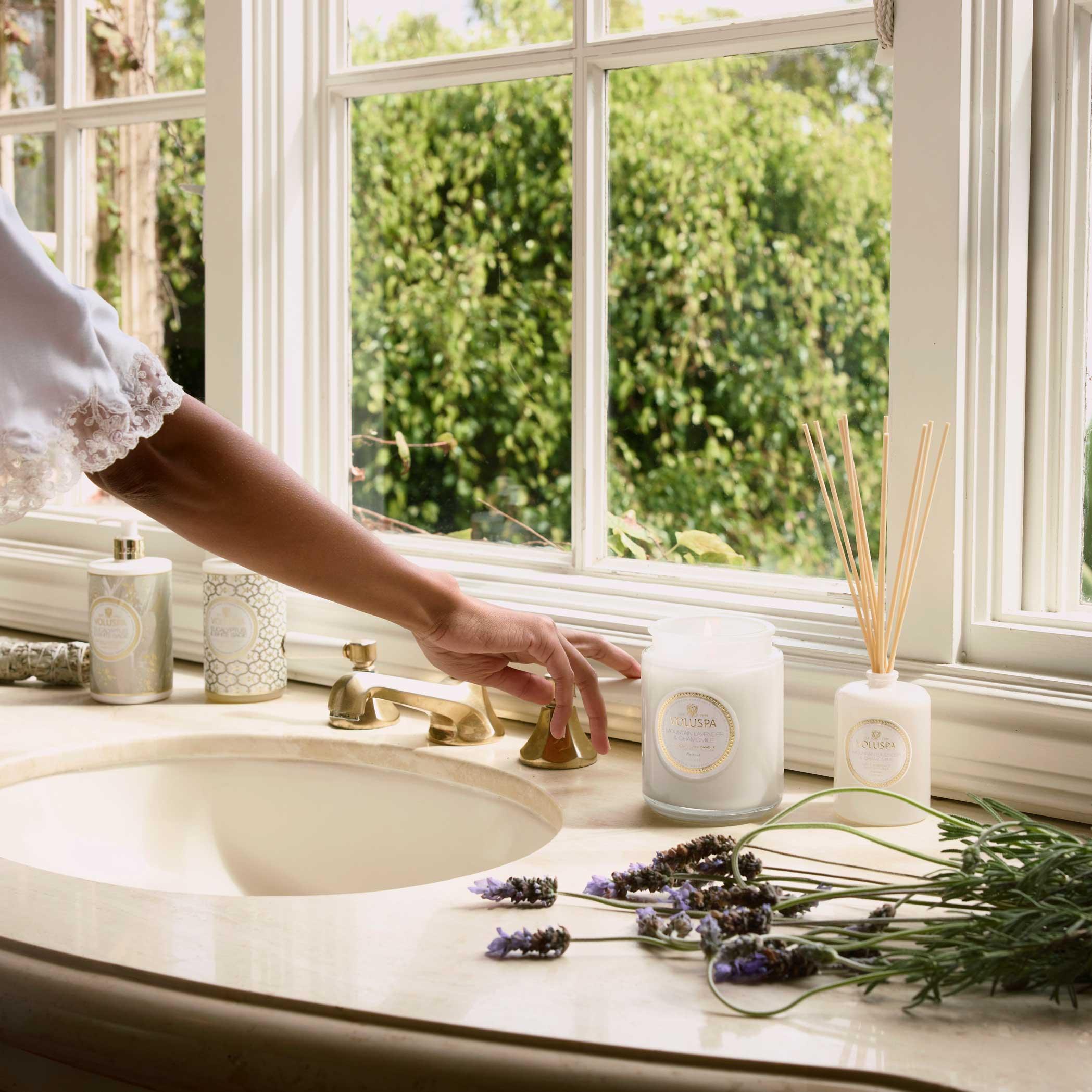 Mountain Lavender and Chamomile Reed Diffuser on sink counter