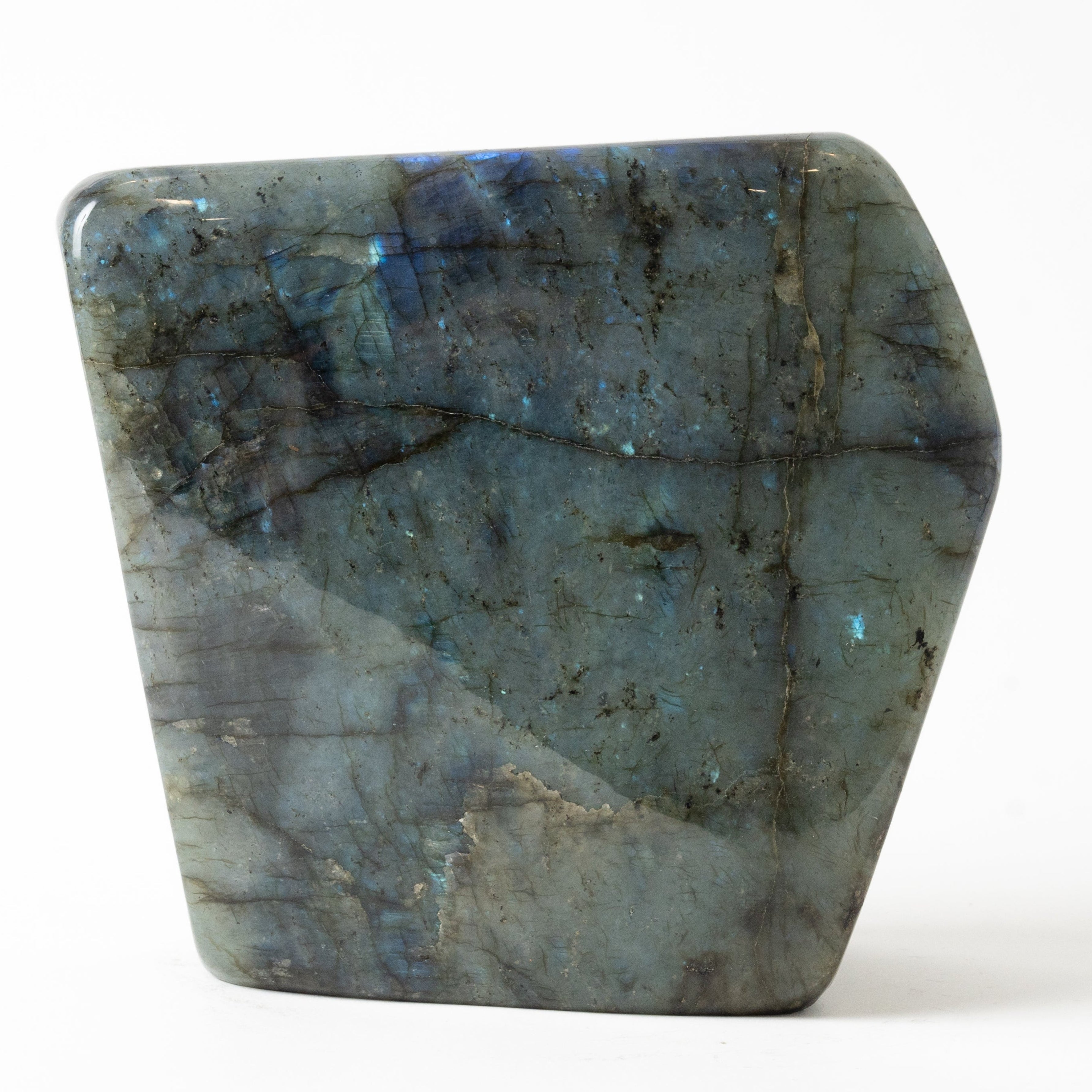 Polished labradorite stone on a white background