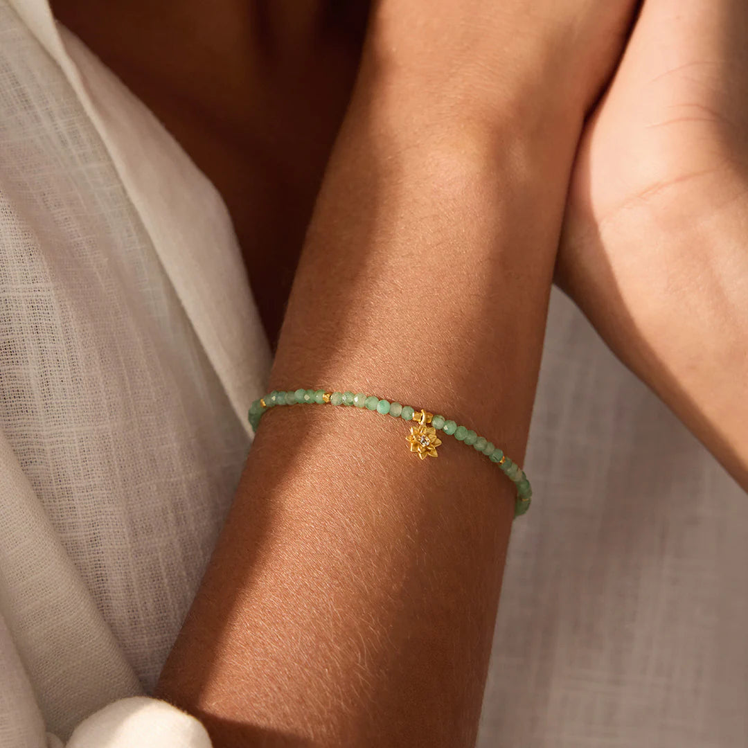 Emerald Lotus Gemstone Bracelet on Arm
