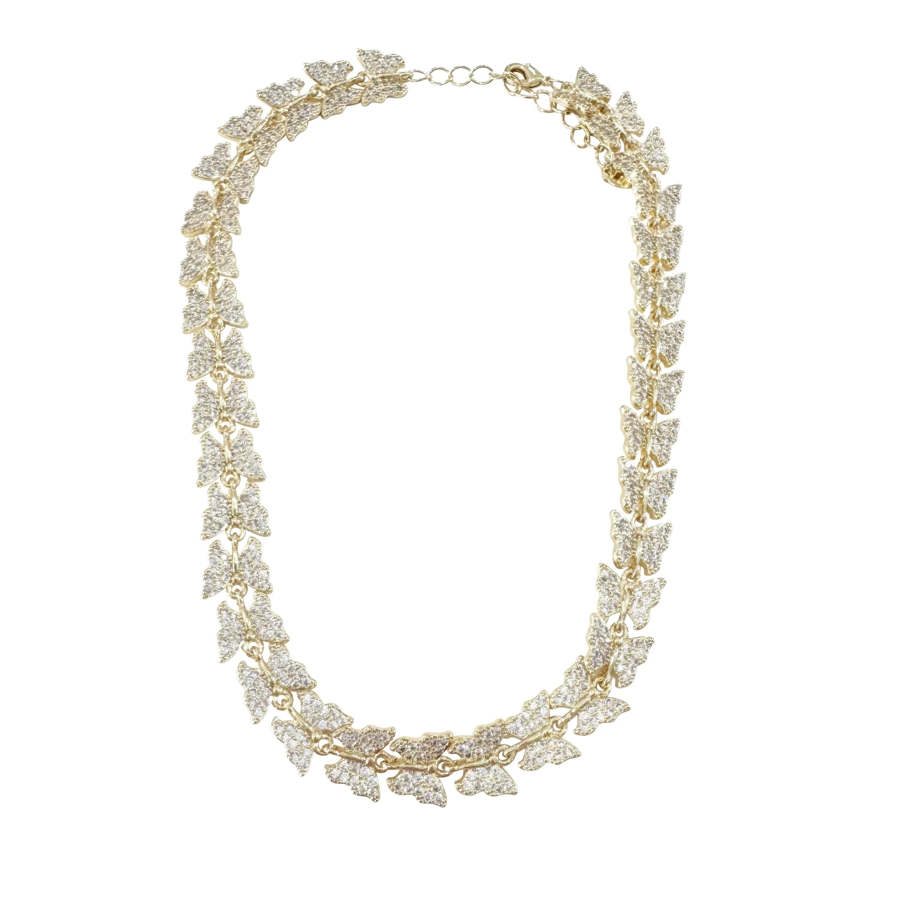 A gold-toned butterfly shaped chain necklace embellished with clear cubic zirconia displayed against a solid white background.