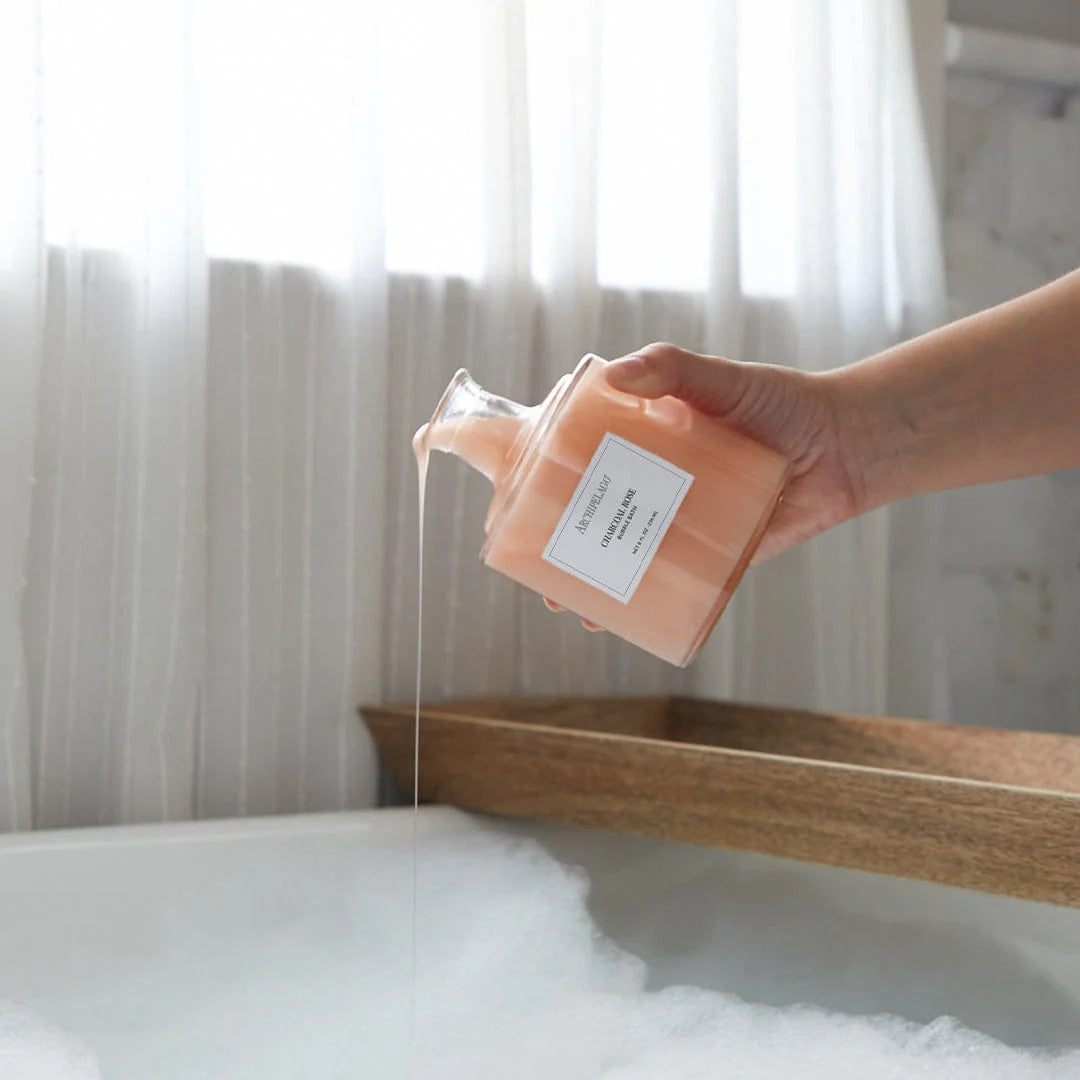 Charcoal Rose Luxury Bubble Bath Pouring in Tub