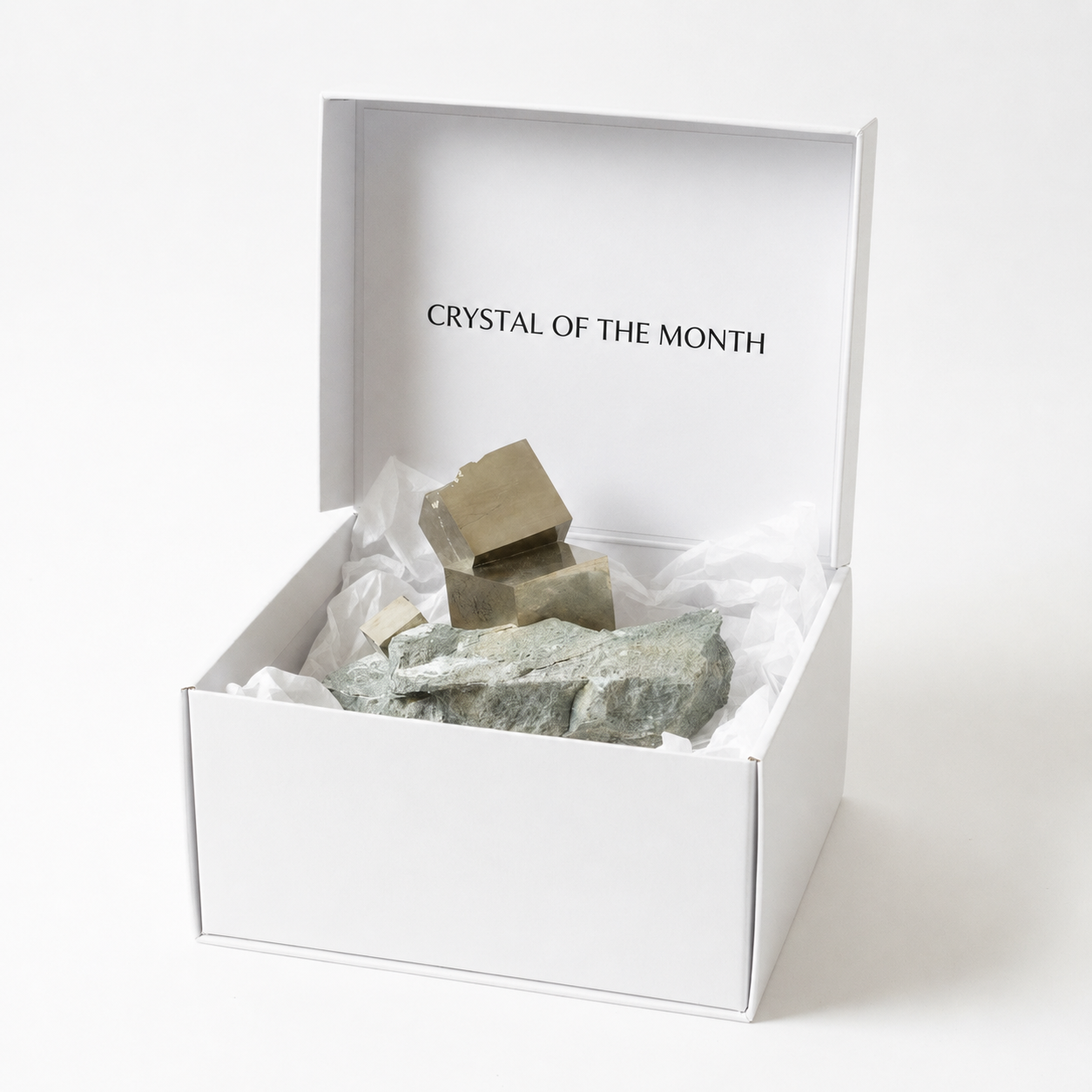 Box containing crystals with 'Crystal of the Month' text on a white background