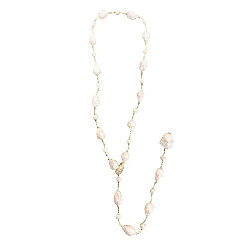 Long pearl necklace on a white background
