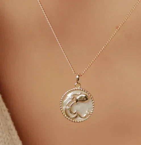 Aquarius Mother of Pearl Zodiac Sign Medallion Necklace on neck