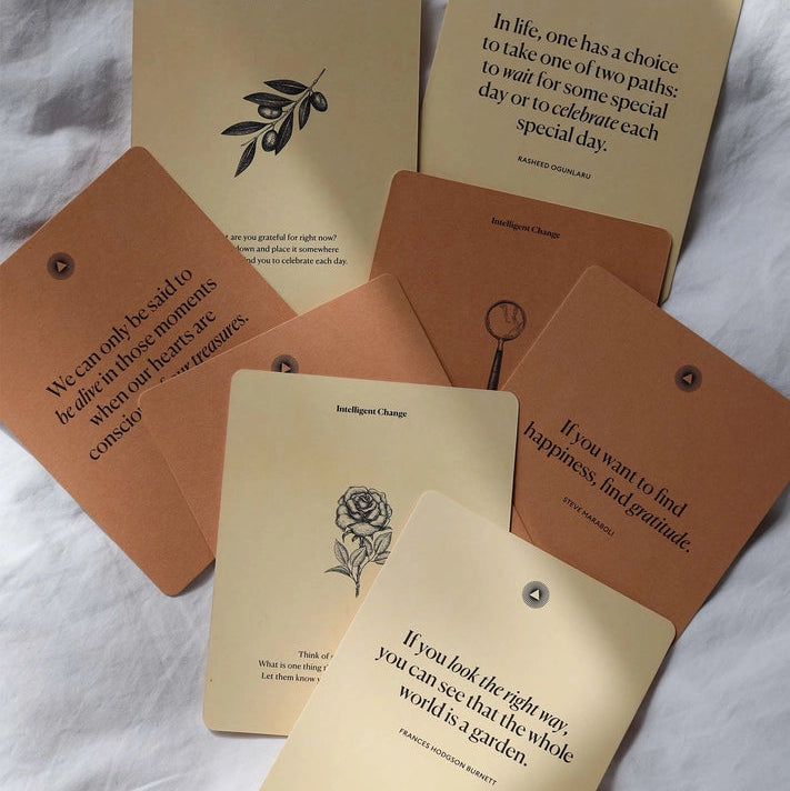 Set of motivational cards with text and illustrations on a white fabric background