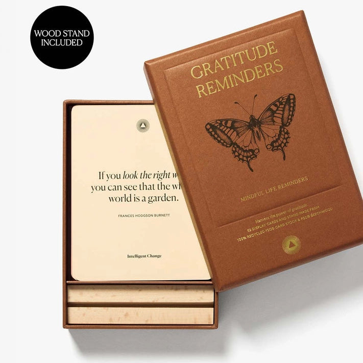 Brown 'Gratitude Reminders' book with butterfly design on a white background