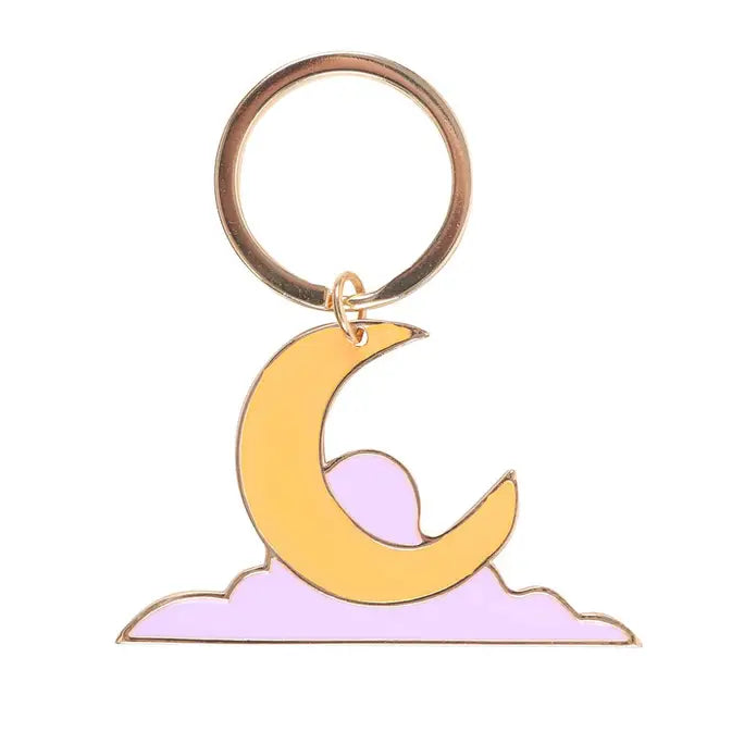 Keychain with a gold crescent moon and pink cloud design on a white background