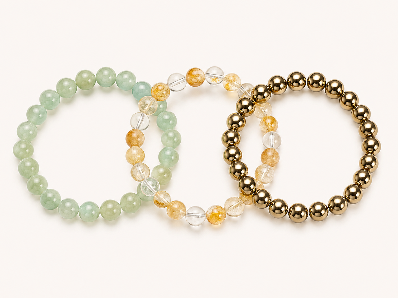 Three beaded bracelets Aventurine, pyrite, citrine on a white background