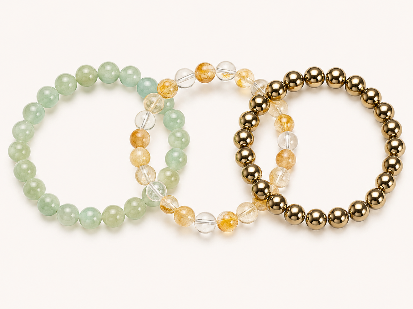Three beaded bracelets Aventurine, pyrite, citrine on a white background