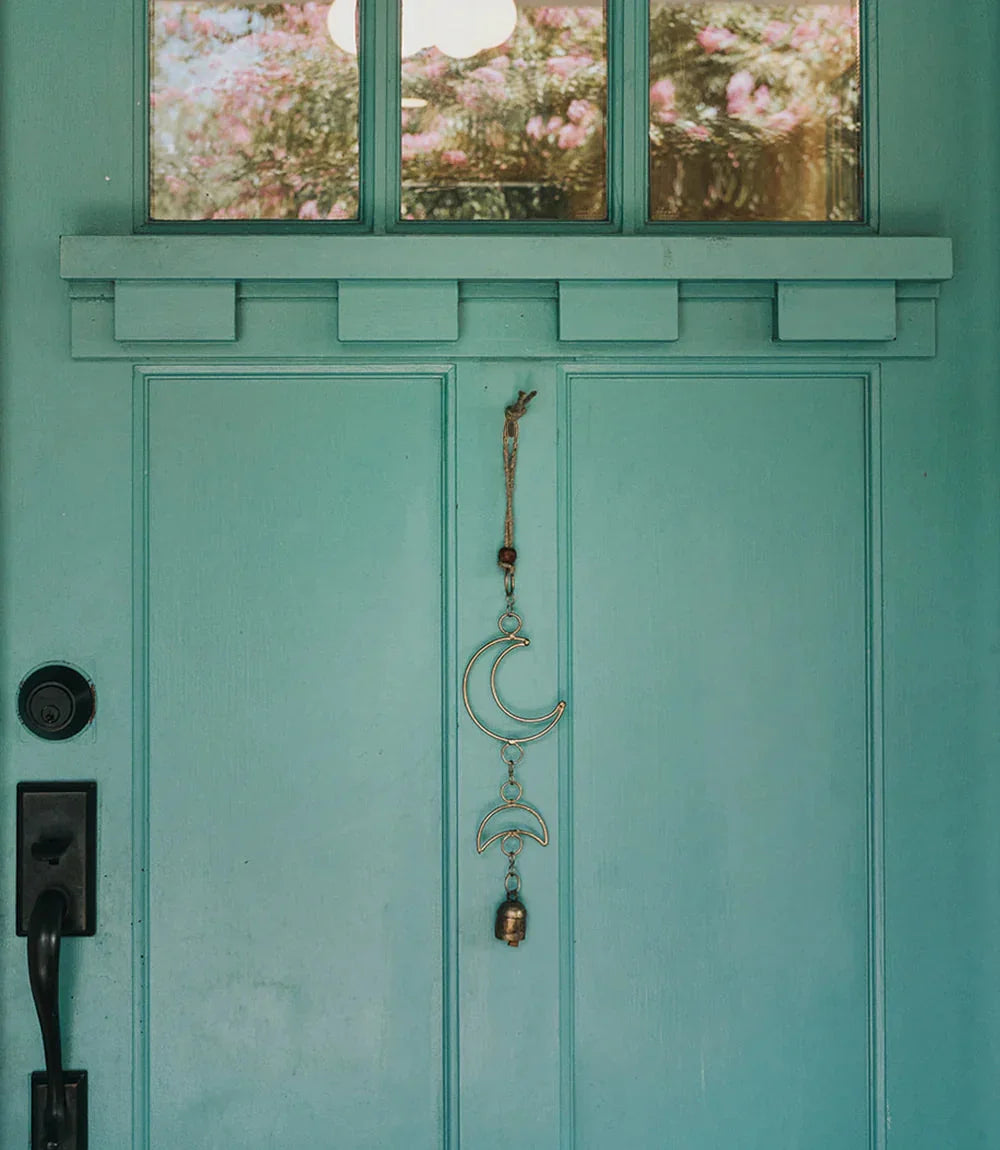 Moon Phase Bell Wind Chime on Teal Door