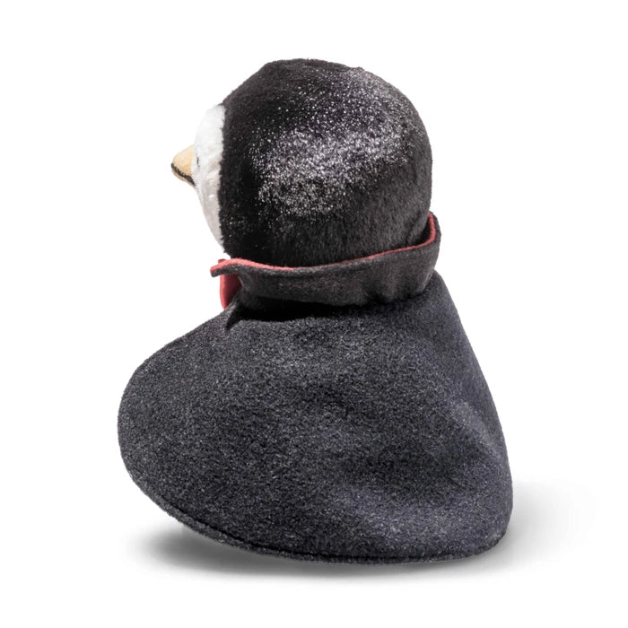 A plush penguin hat with a dark gray felted wool neck warmer and a black plush penguin head, shown from the back on a white background.