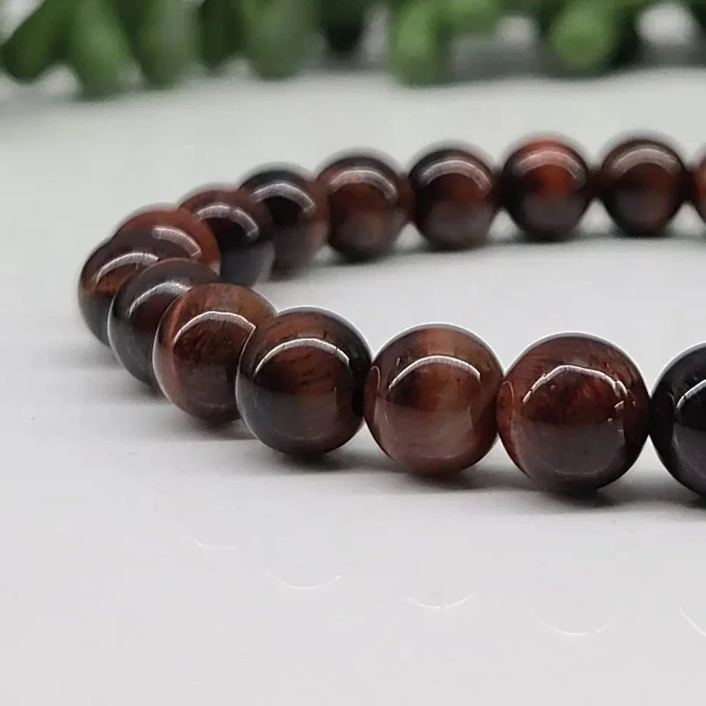 Red Tiger Eye 8mm Smooth Bead Stretch Bracelet Up Close