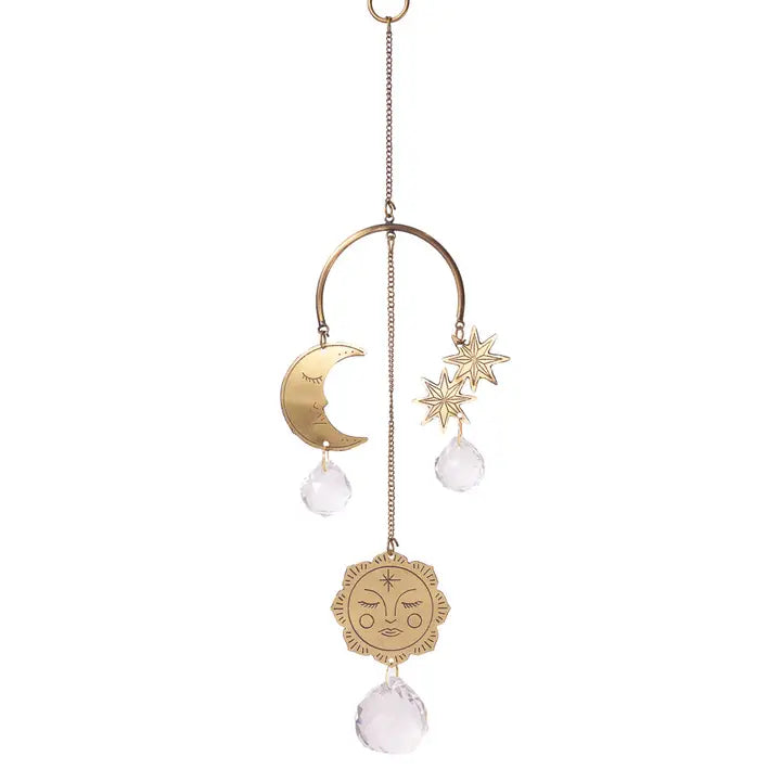 Decorative hanging suncatcher with celestial design on a white backgroundbackground
