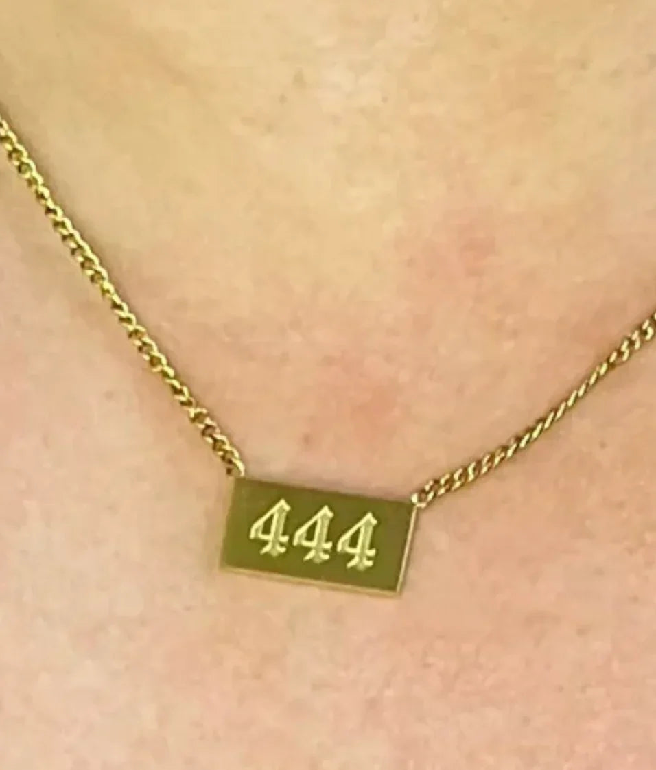 444 Angel Number Necklace on Model.