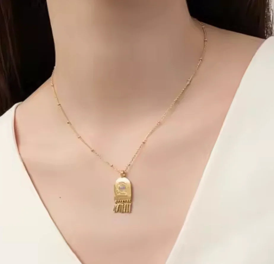 Open Door Solar Chime Amulet Necklace on Model