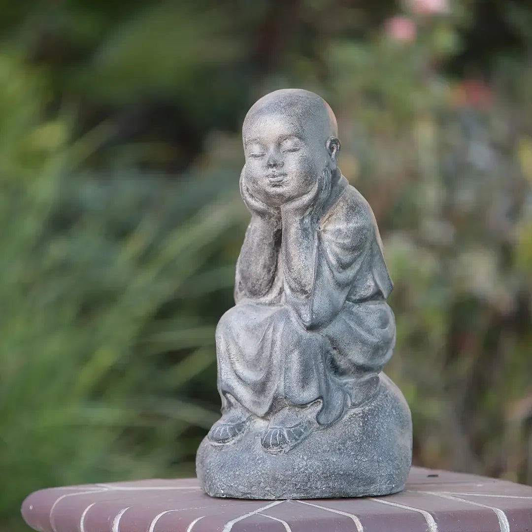 Serene Shaolin Monk Sitting on Stone