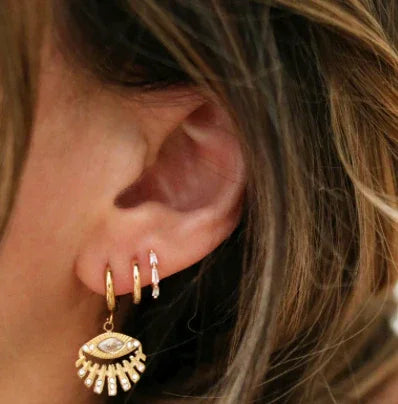 Evil Eye Charm Hoop Earrings on Ear