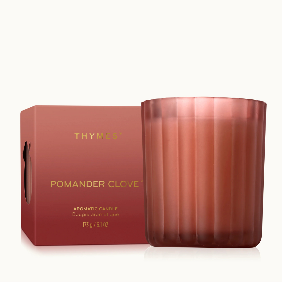 Thymes pomander clove candle with packaging on a white background