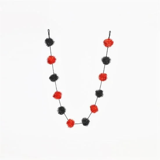 180 Degrees Halloween Tinsel Ball Garland Black and Orange Houston