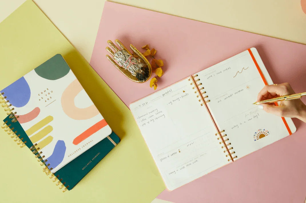 Take Care' Guided Wellness Journal On Table
