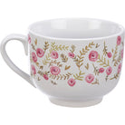White mug with floral pattern on a white background
