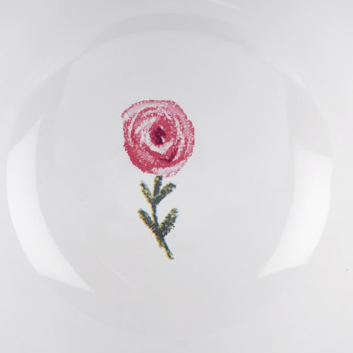 Red rose stamp on a white background inside the mug