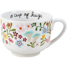 Cup of Hugs Mug with floral design and 'a cup of hugs' text on a white background