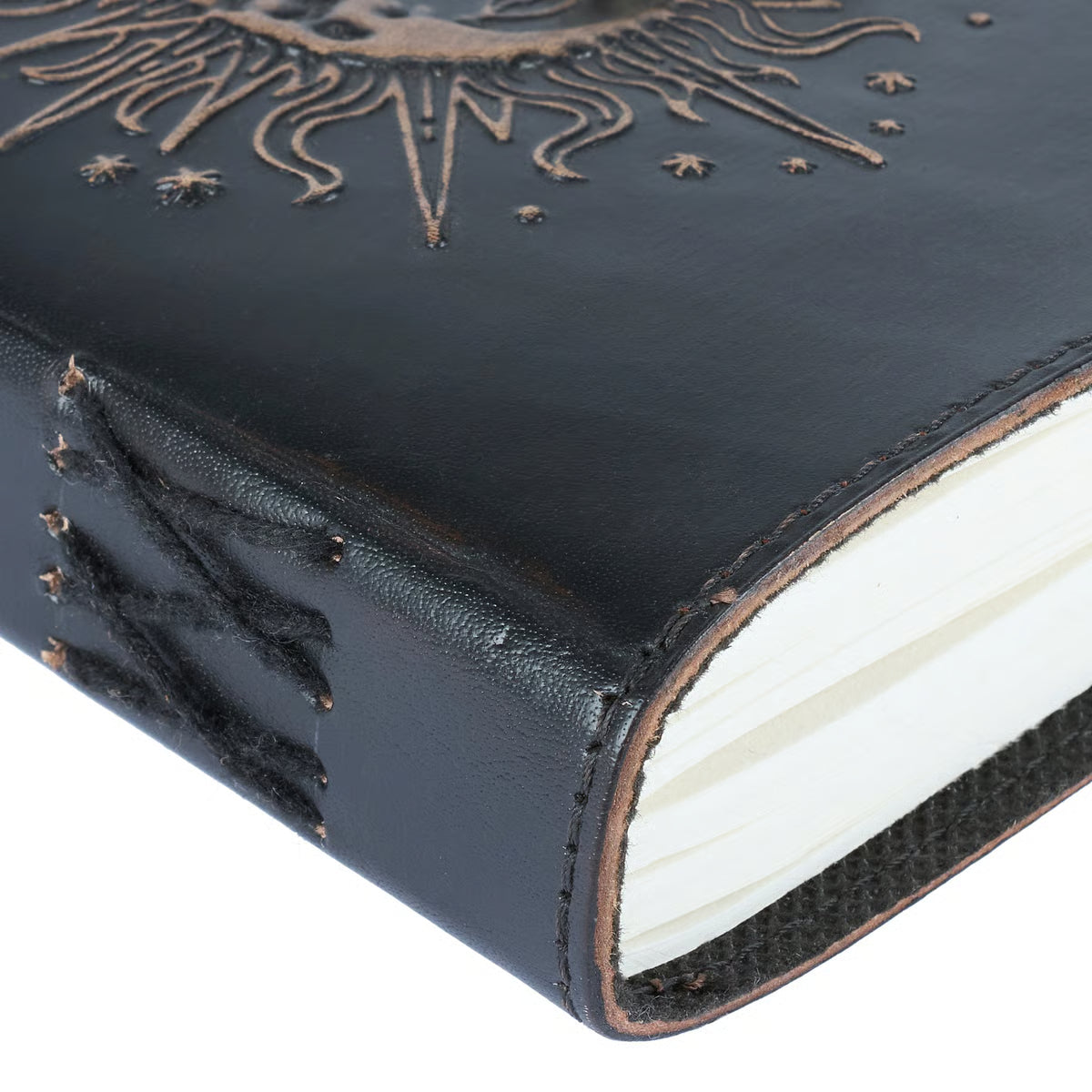 Black leather-bound book with intricate design on cover