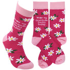 Pink socks with daisy flowers and text on a white background