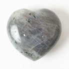 Purple Flash Labradorite Heart-shaped stone on a white background