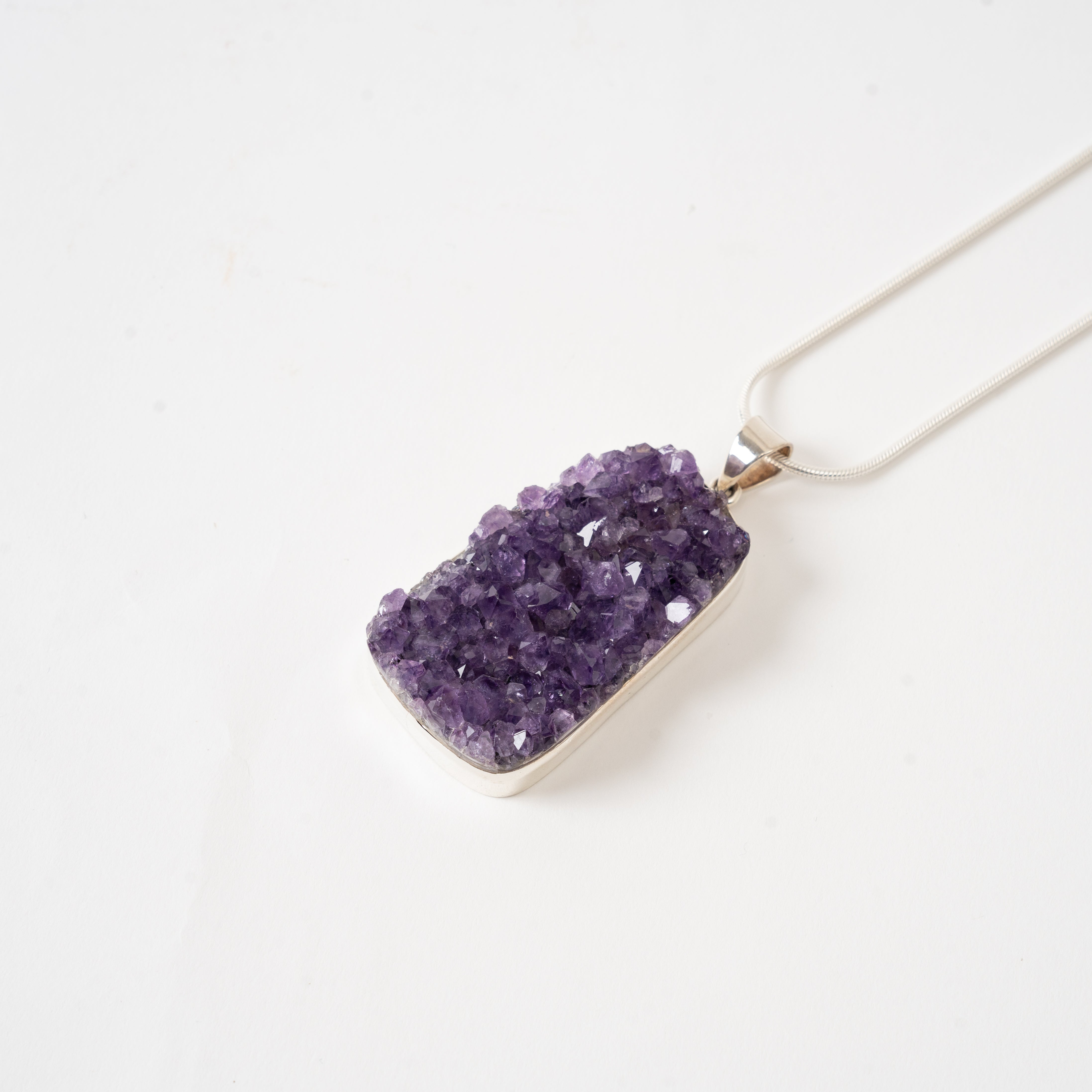 Amethyst Cluster pendant necklace on a white background