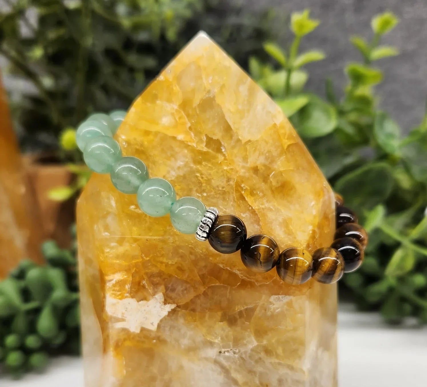 Wealth: Green Aventurine & Tiger Eye Bracelet 8mm Beads Side View on Citrine Point