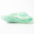 Green fluorite stone on a white background