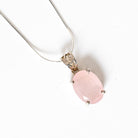 Necklace with a pink Morganite Faceted stone pendant on a white background