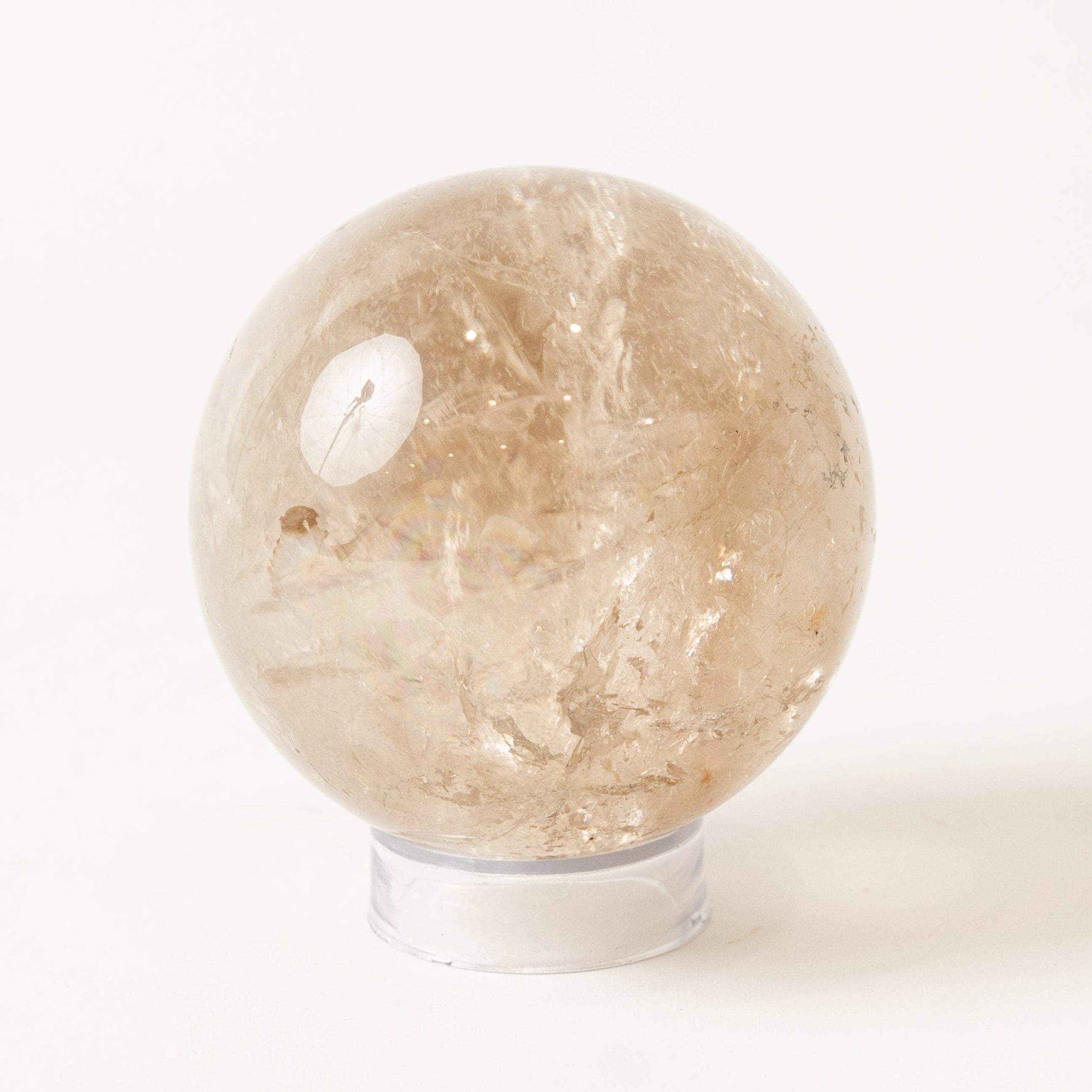 Round Smoky Quartz stone on a white background