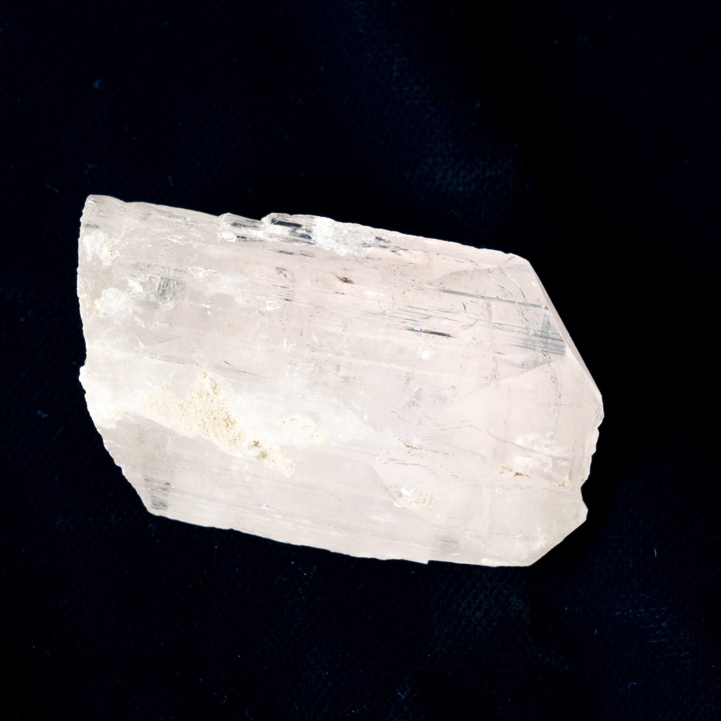 Danburite Crystal on a black background