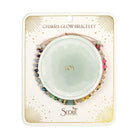 Chakra glow bracelet packaging with 'JOY' on a white background